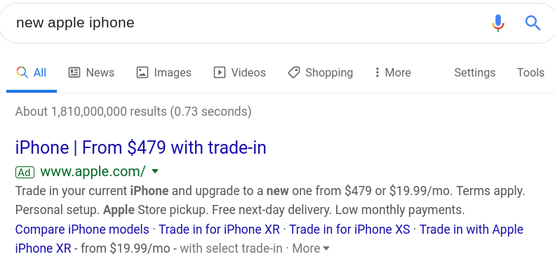 A Pay-Per-Click ad from Apple that uses a branded keyword and a special offer.