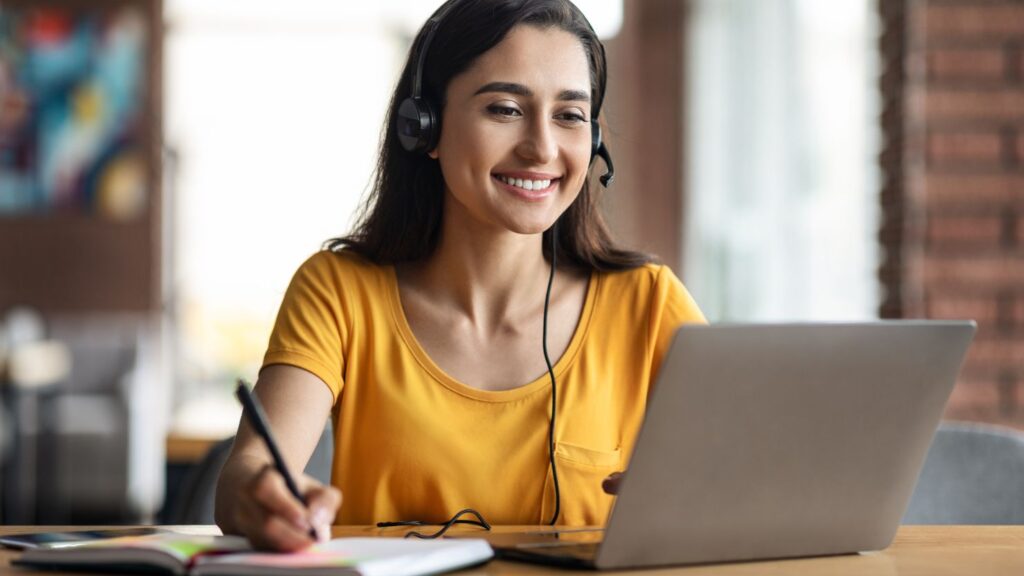 happy student taking an online course